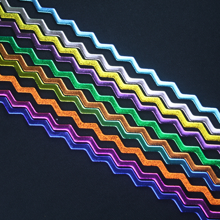 Primary Colors Dichroic on 6 mm Black Firestrip 90 COE 16 in. long link